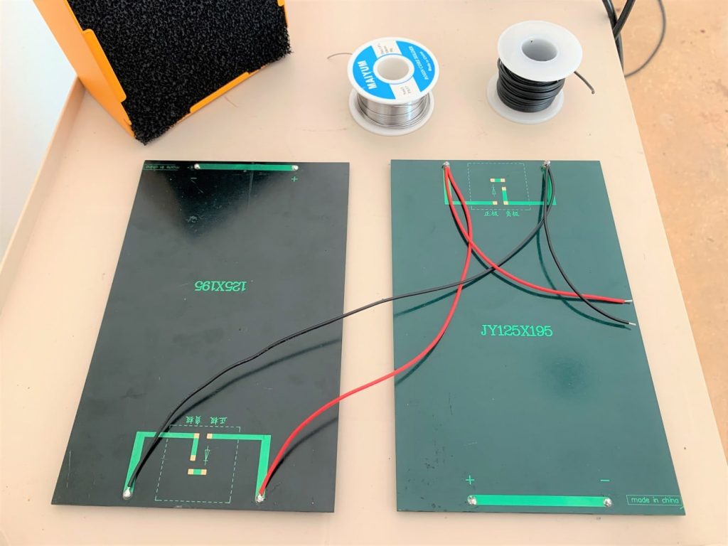 Two portable solar panels wired in parallel