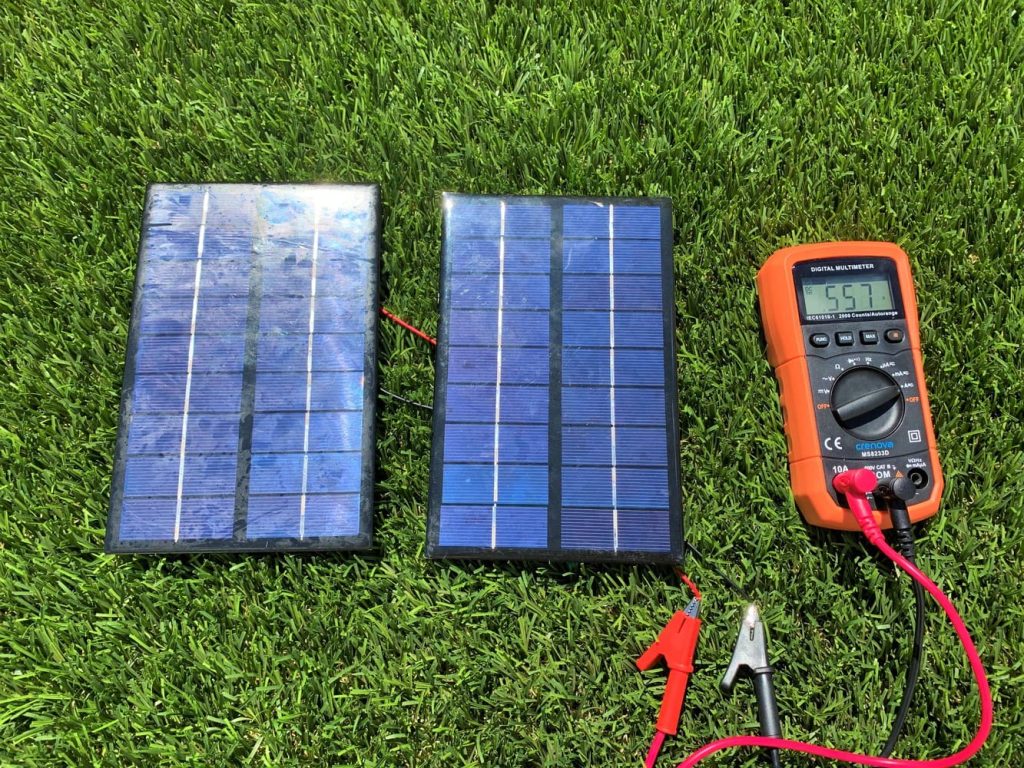 Testing the amperage of two solar panels wired in parallel with a digital multimeter
