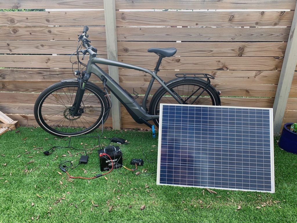 Solar charging an electric bike with a 100w solar panel