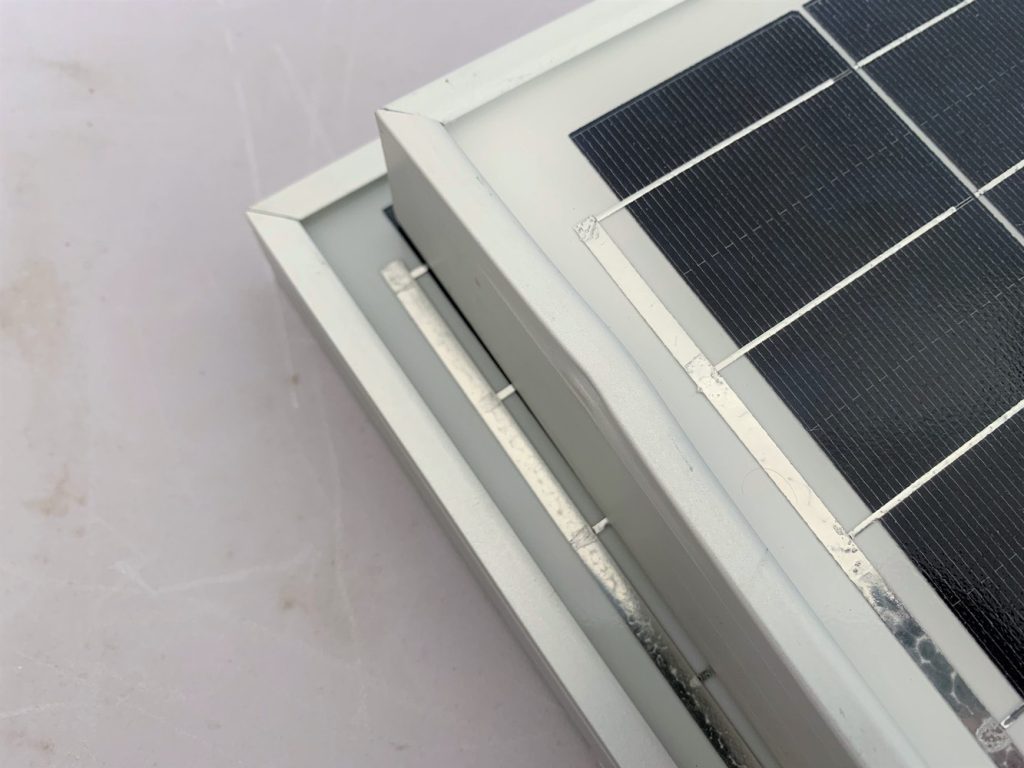 A solar panel with a dented frame